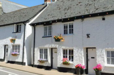 White cottages with flowers outside