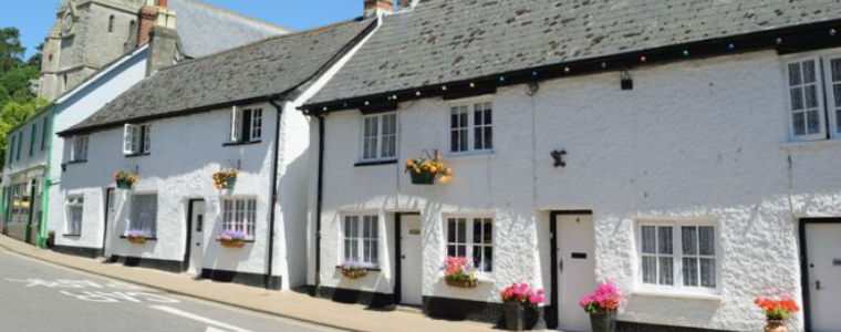 White cottages with flowers outside